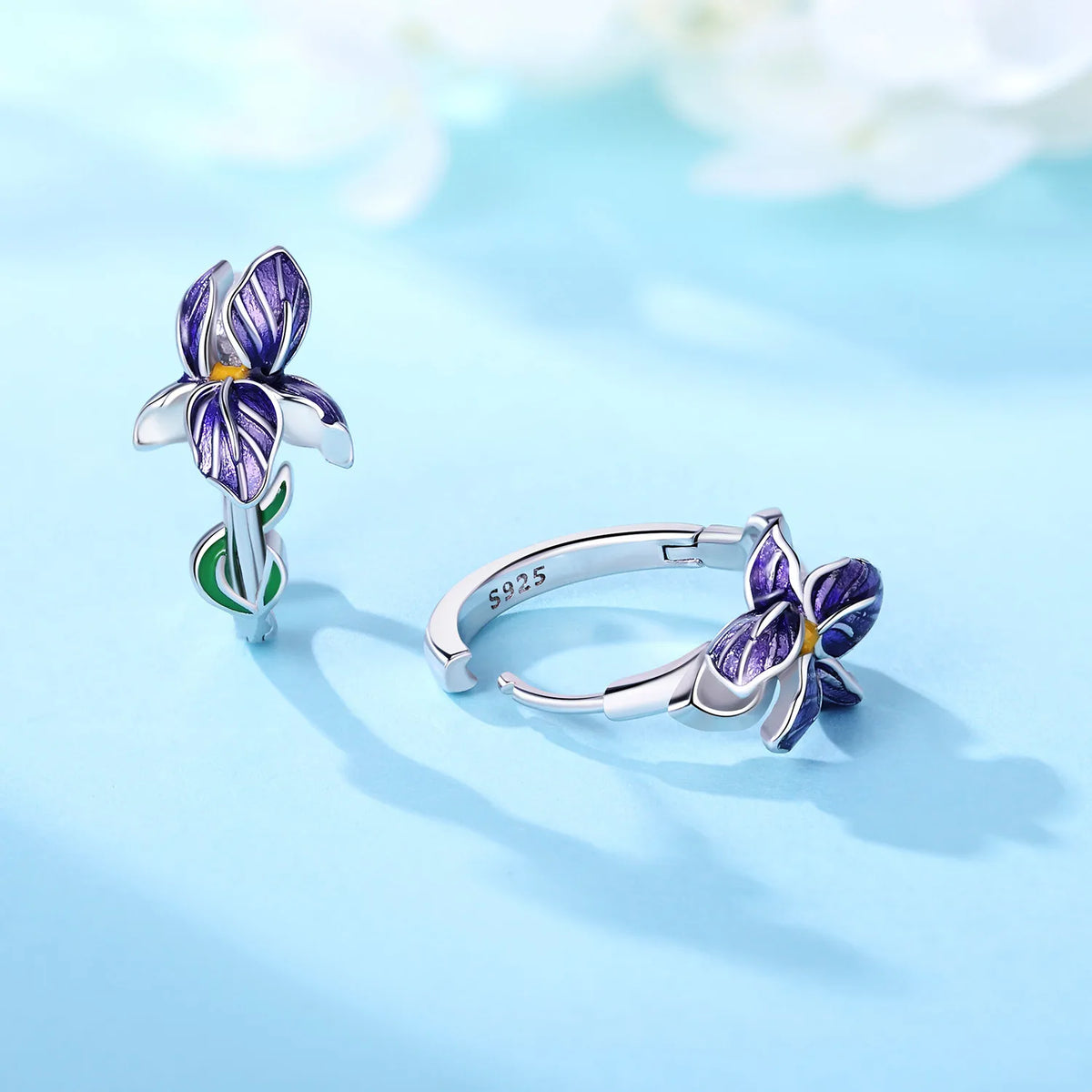Sterling silver huggie earrings, side view: purple iris flower with green leaf enamel