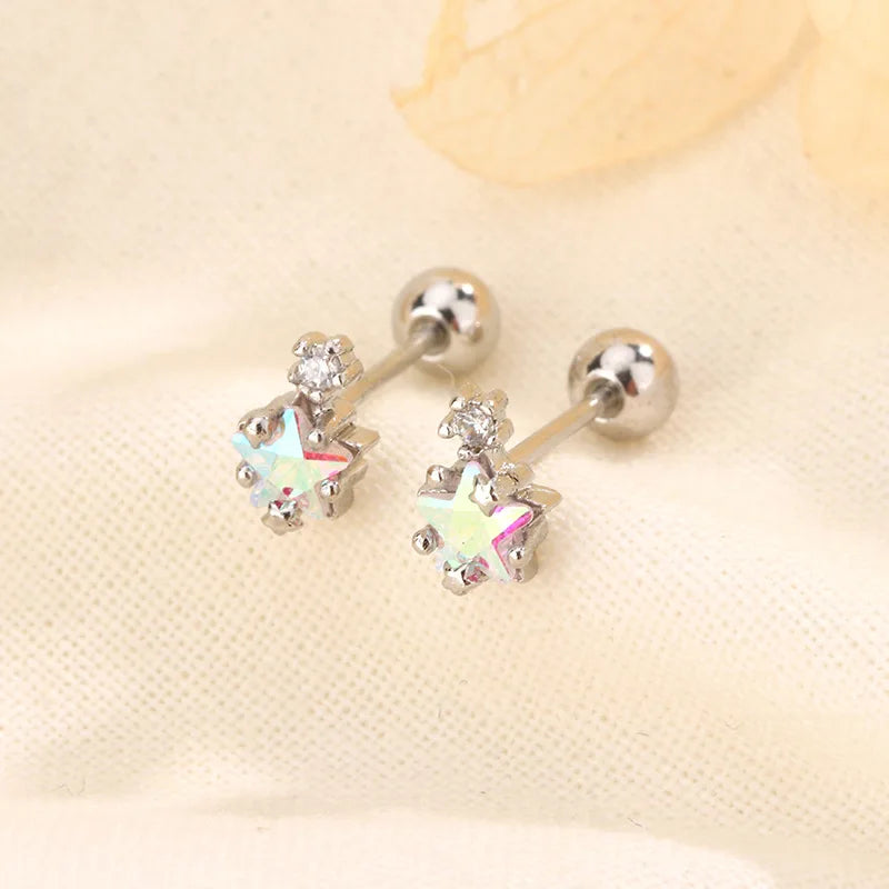 Silver huggie hoop earrings with multi-color crystal heart-shaped charm