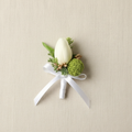 Cream silk rose boutonniere with green pompom blooms, white ribbon, leaf accents
