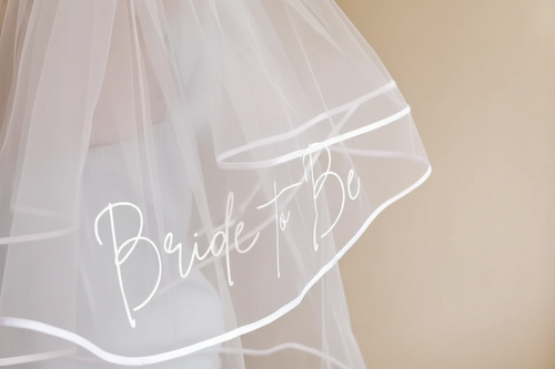 Bride to be veil in white sheer, "Bride to Be" script across front
