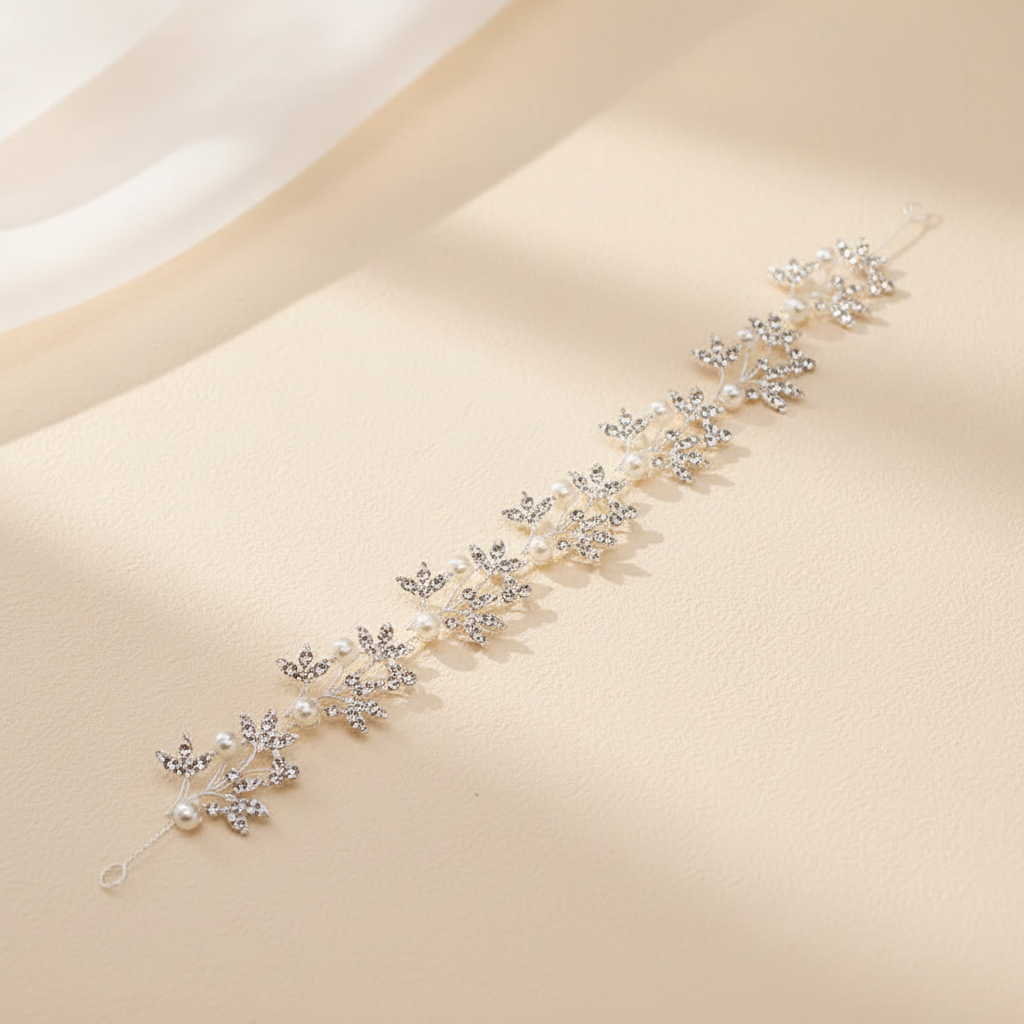 Rhinestone floral headband with row of small starburst stones and pearl beads