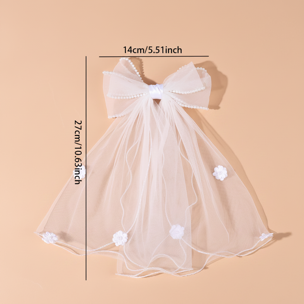 White tulle bow hair clip with sheer veil and small flower appliques