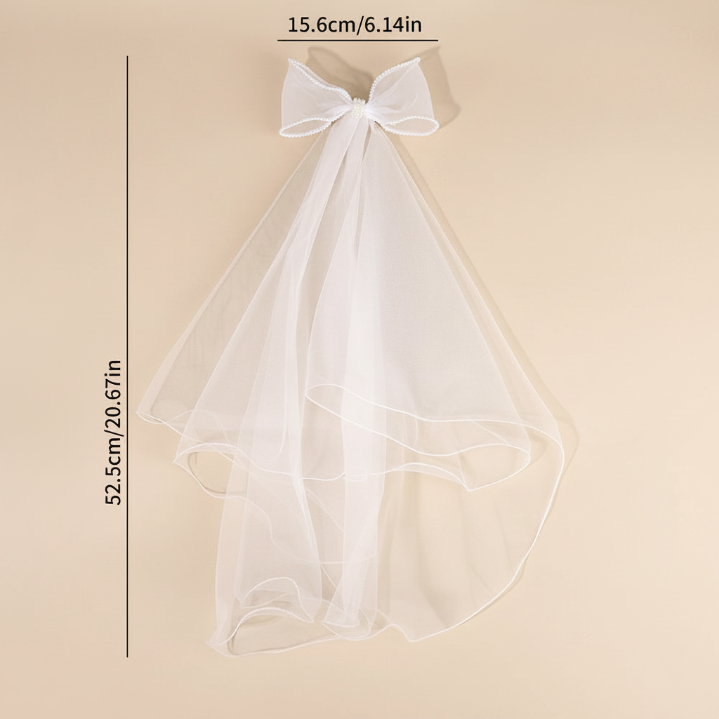 White tulle bow hair clip with long veil layers and faux pearl trim